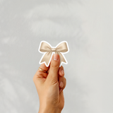 CREAM COQUETTE BOW CUSTOM CUT SOLVENT STICKER- GLOSSY OR MATTE