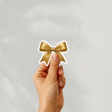 GOLD COQUETTE BOW CUSTOM CUT SOLVENT STICKER- GLOSSY OR MATTE